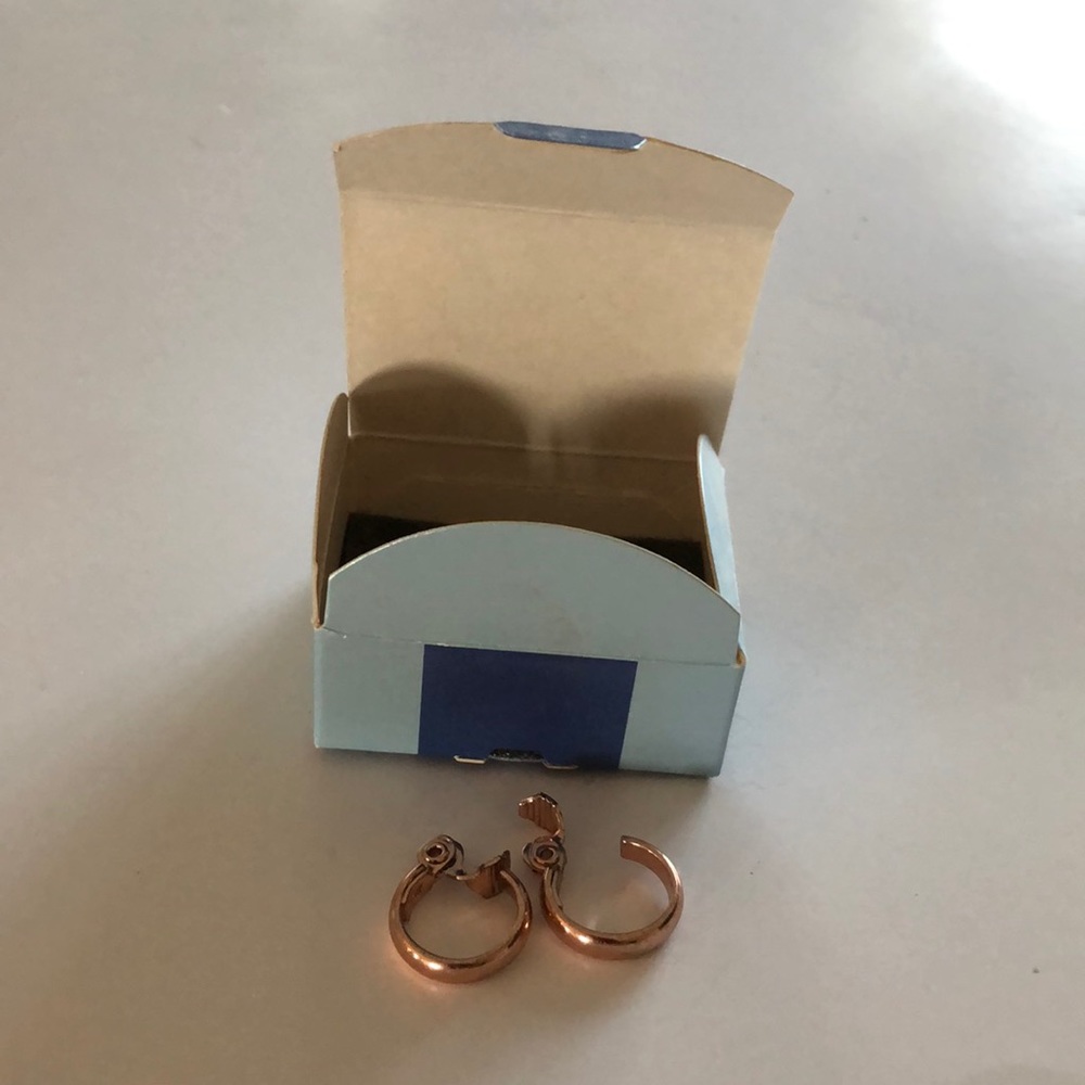 Avon copper color clip-on earrings